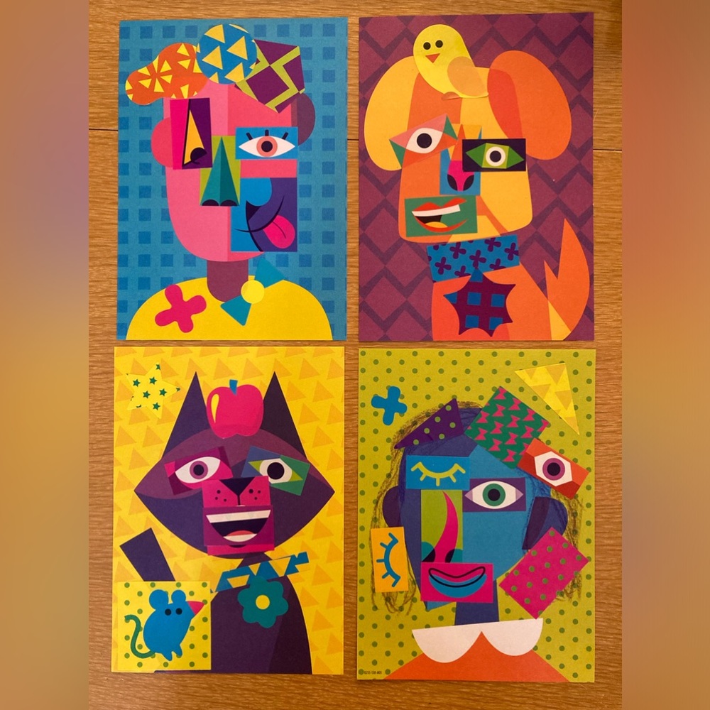 Abstract art pages with stickers attached from Wendy’s kids meal